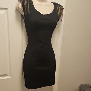 Elegant Black Dress with Gold Accents
